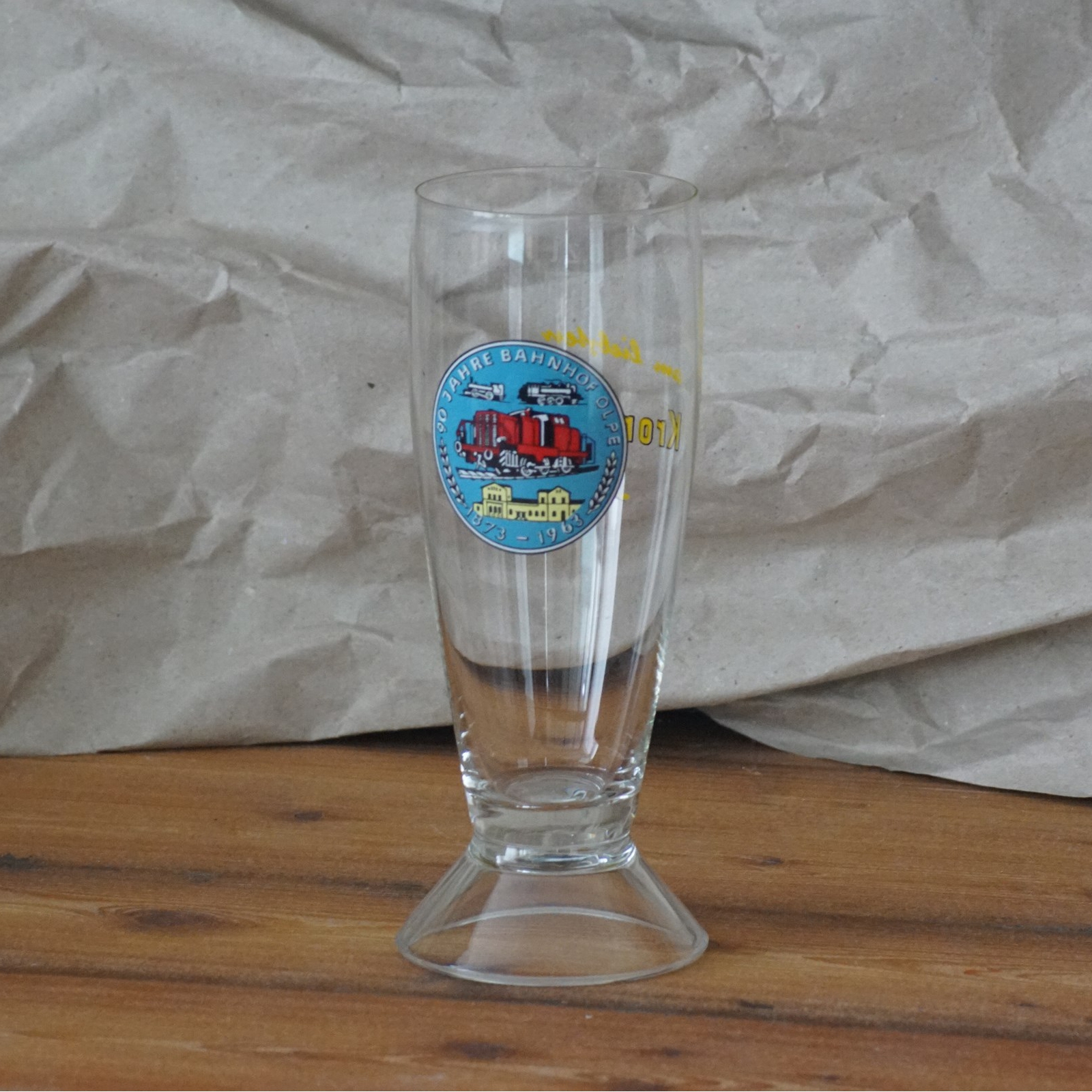 Bierglas der Krombacher Brauerei zum 90jährigen Jubiläum des Bahnhof Olpe (vor 1970)